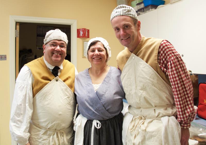 Marion Police Lt. John Garcia, Asst. Town Clerk Michele Bissonnette and Selectman Jody Dickerson prepared a three course colonial meal. BY GEORGIA SPARLING
